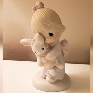 Precious Moments Jesus loves me figurine.